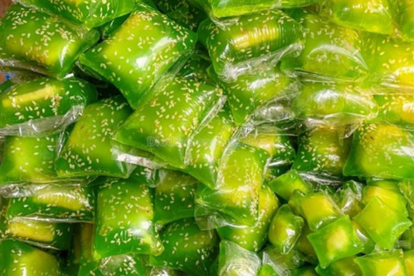 Traditional Banh Com with green rice shell and mung bean filling from Hanoi